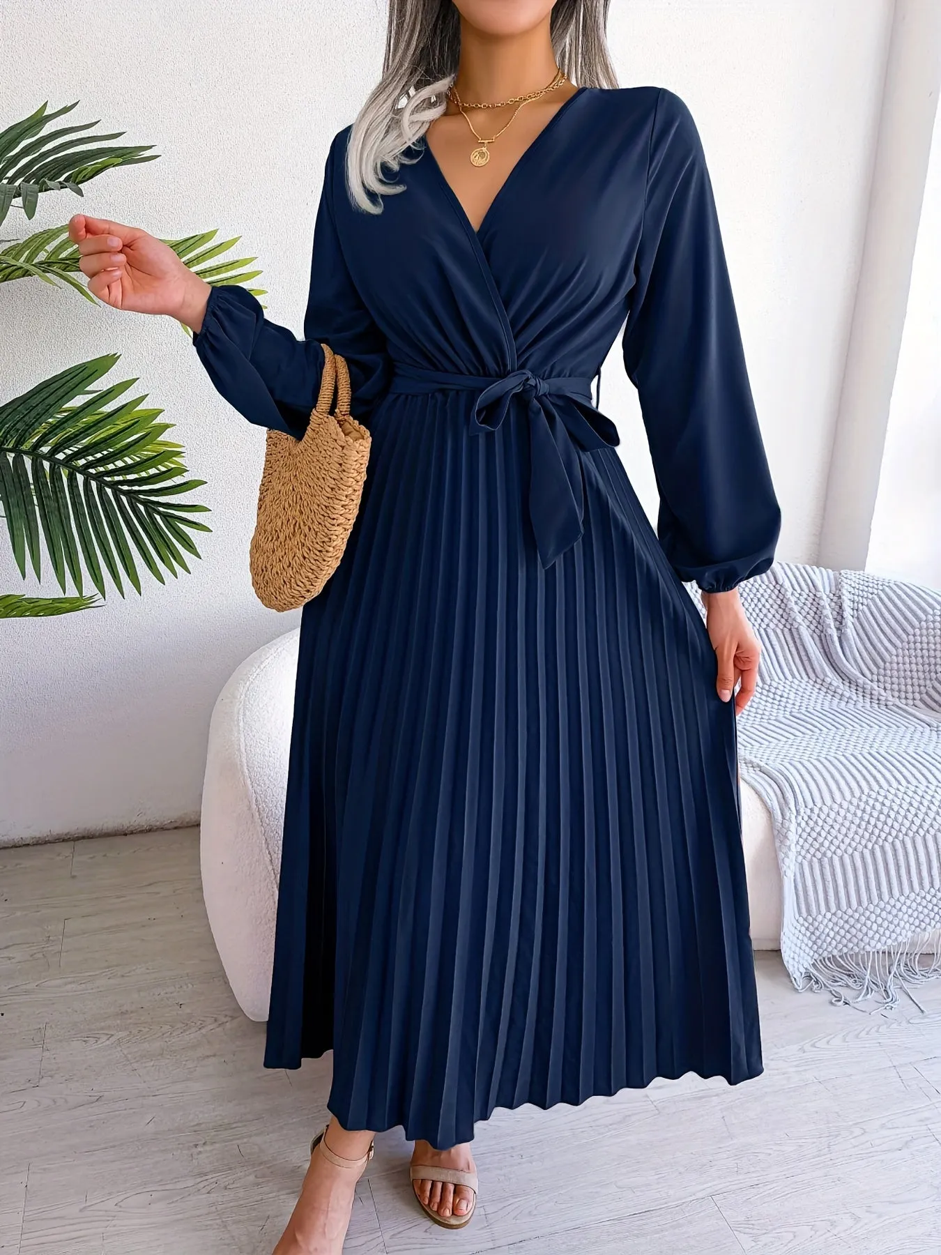 Camille - Elegant pleated dress with long sleeves and crossover neckline
