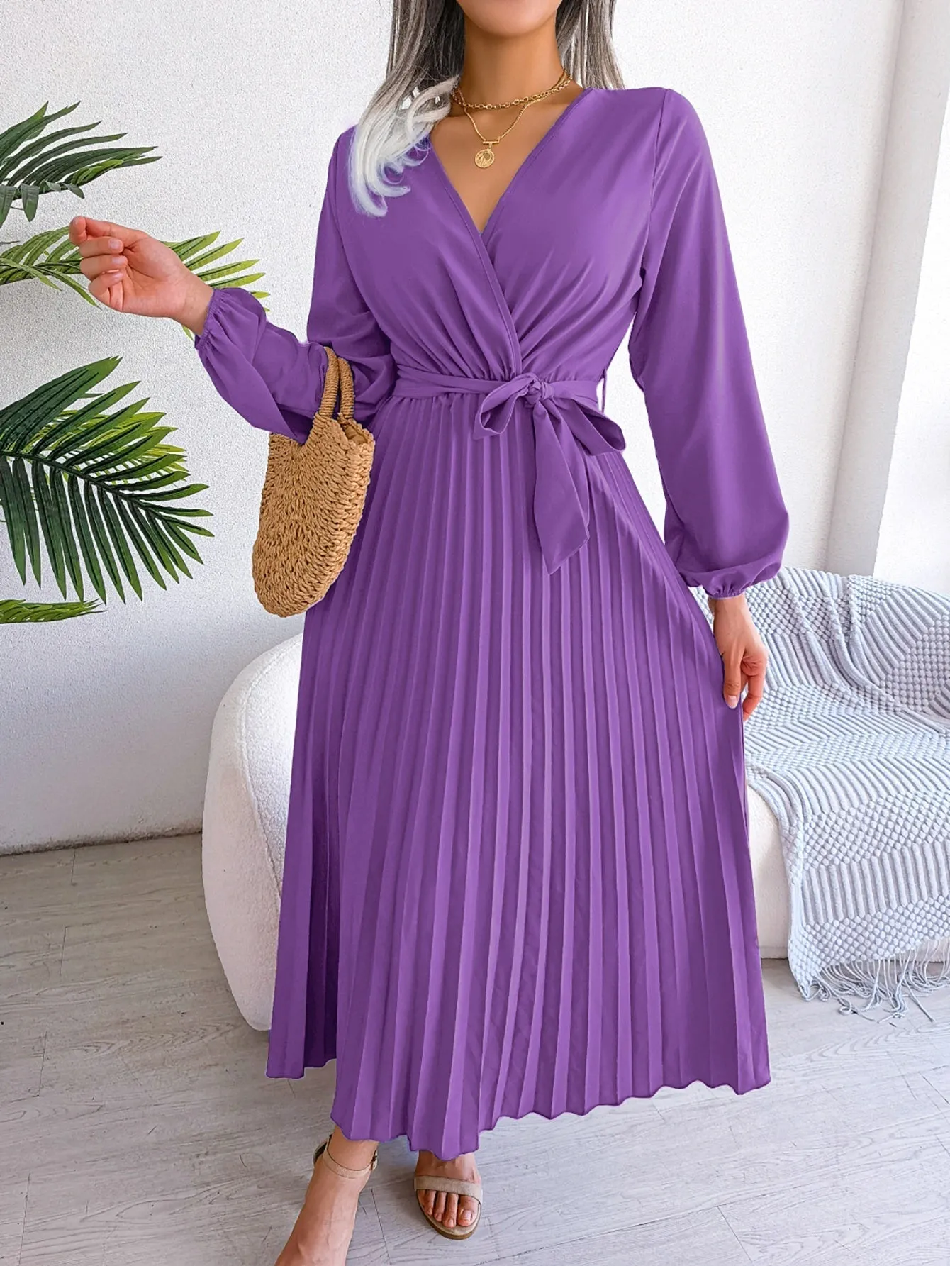 Camille - Elegant pleated dress with long sleeves and crossover neckline