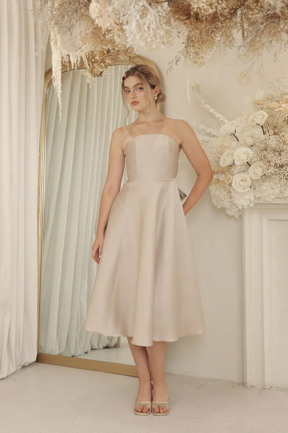 CELINE Strapless Curved Neckline Mid Length Gown with Bow, Pockets and Covered Buttons (Tan Gazaar)