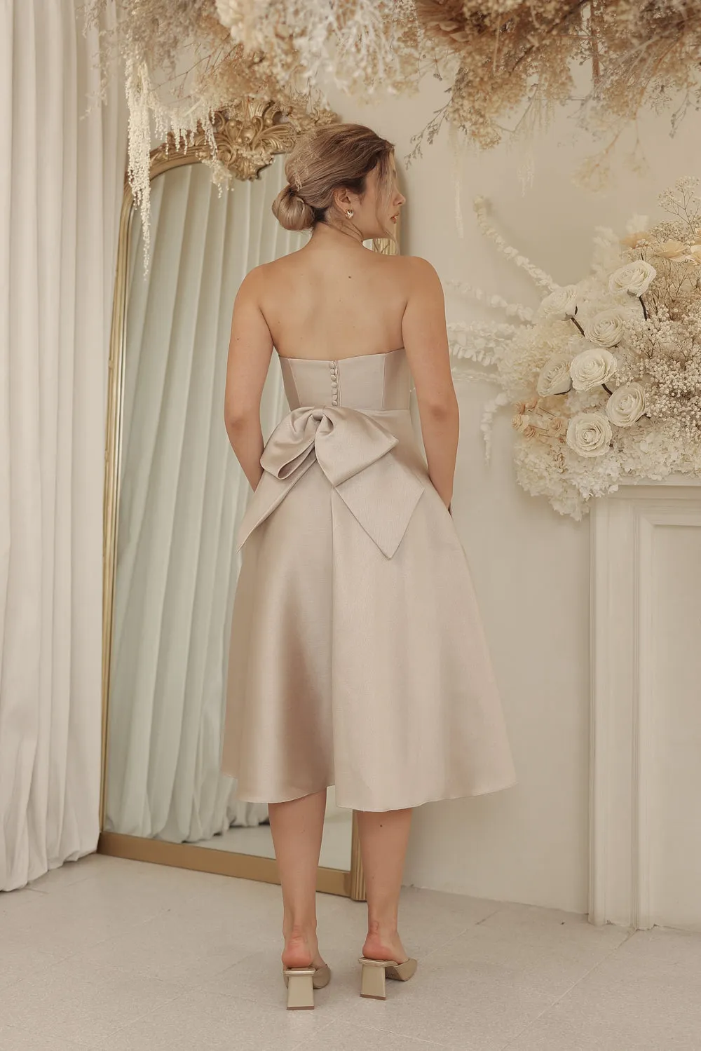 CELINE Strapless Curved Neckline Mid Length Gown with Bow, Pockets and Covered Buttons (Tan Gazaar)