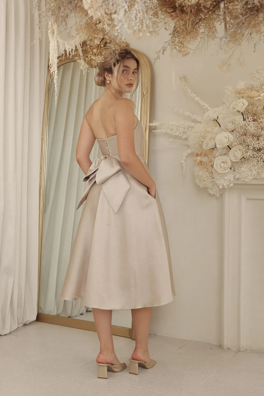 CELINE Strapless Curved Neckline Mid Length Gown with Bow, Pockets and Covered Buttons (Tan Gazaar)