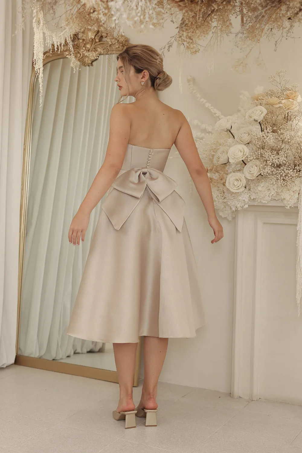 CELINE Strapless Curved Neckline Mid Length Gown with Bow, Pockets and Covered Buttons (Tan Gazaar)