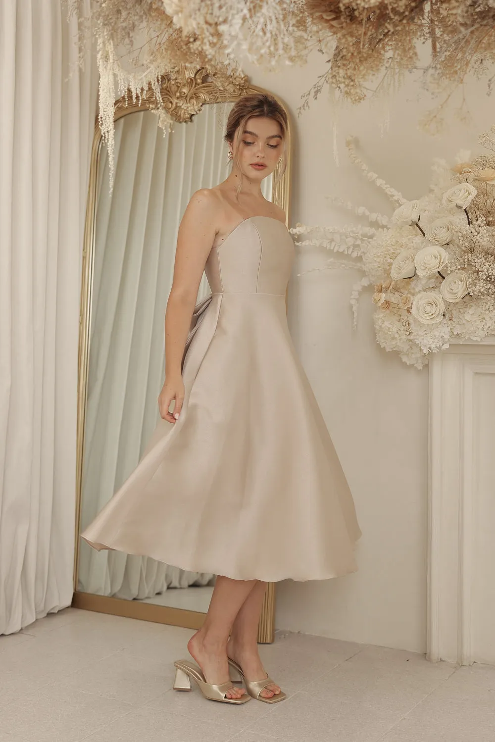 CELINE Strapless Curved Neckline Mid Length Gown with Bow, Pockets and Covered Buttons (Tan Gazaar)