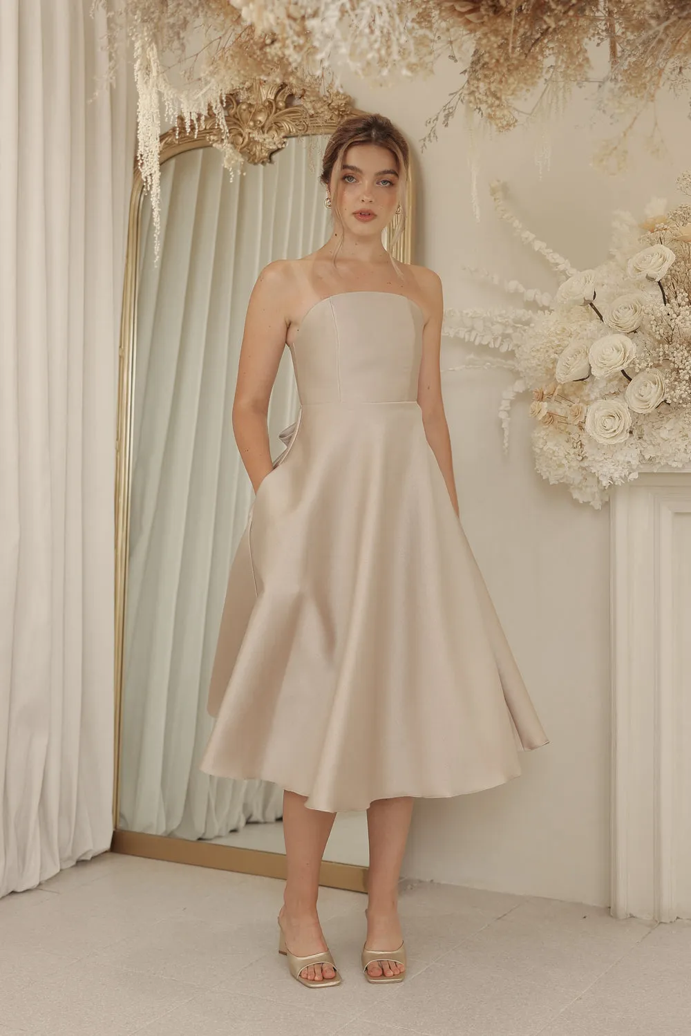 CELINE Strapless Curved Neckline Mid Length Gown with Bow, Pockets and Covered Buttons (Tan Gazaar)