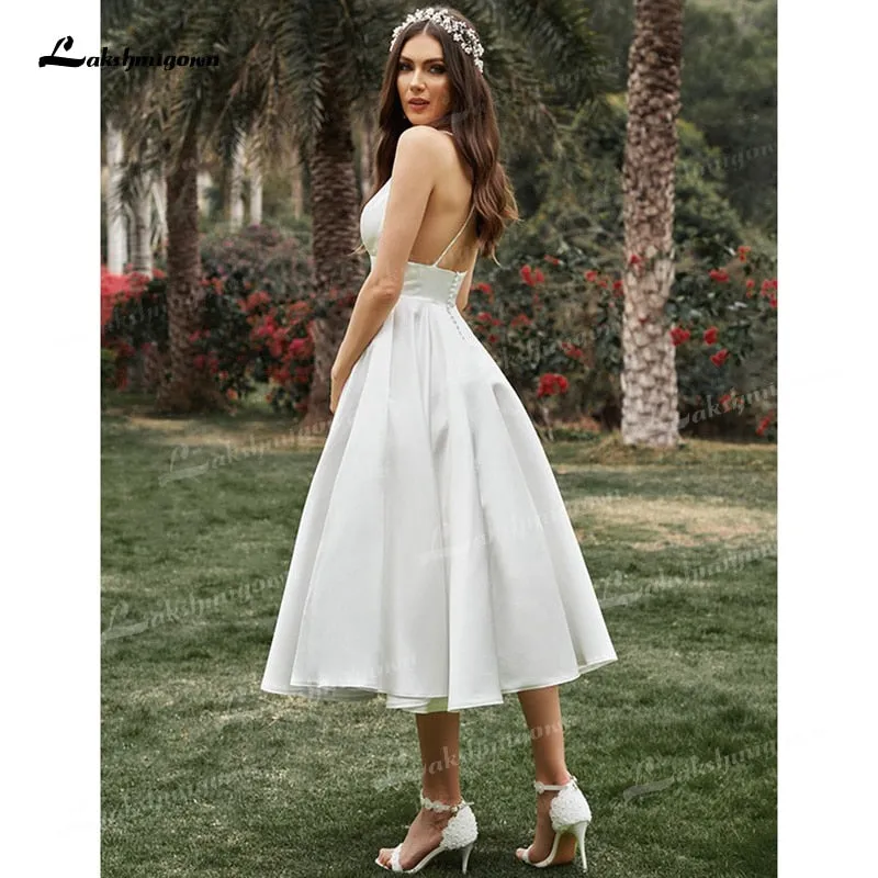 Roycebridal A-Line/Princess Spaghetti Strap Wedding Dress Ruffles V-neck Sleeveless Soft Satin Tea-Length Backless Simple vestidos de novia