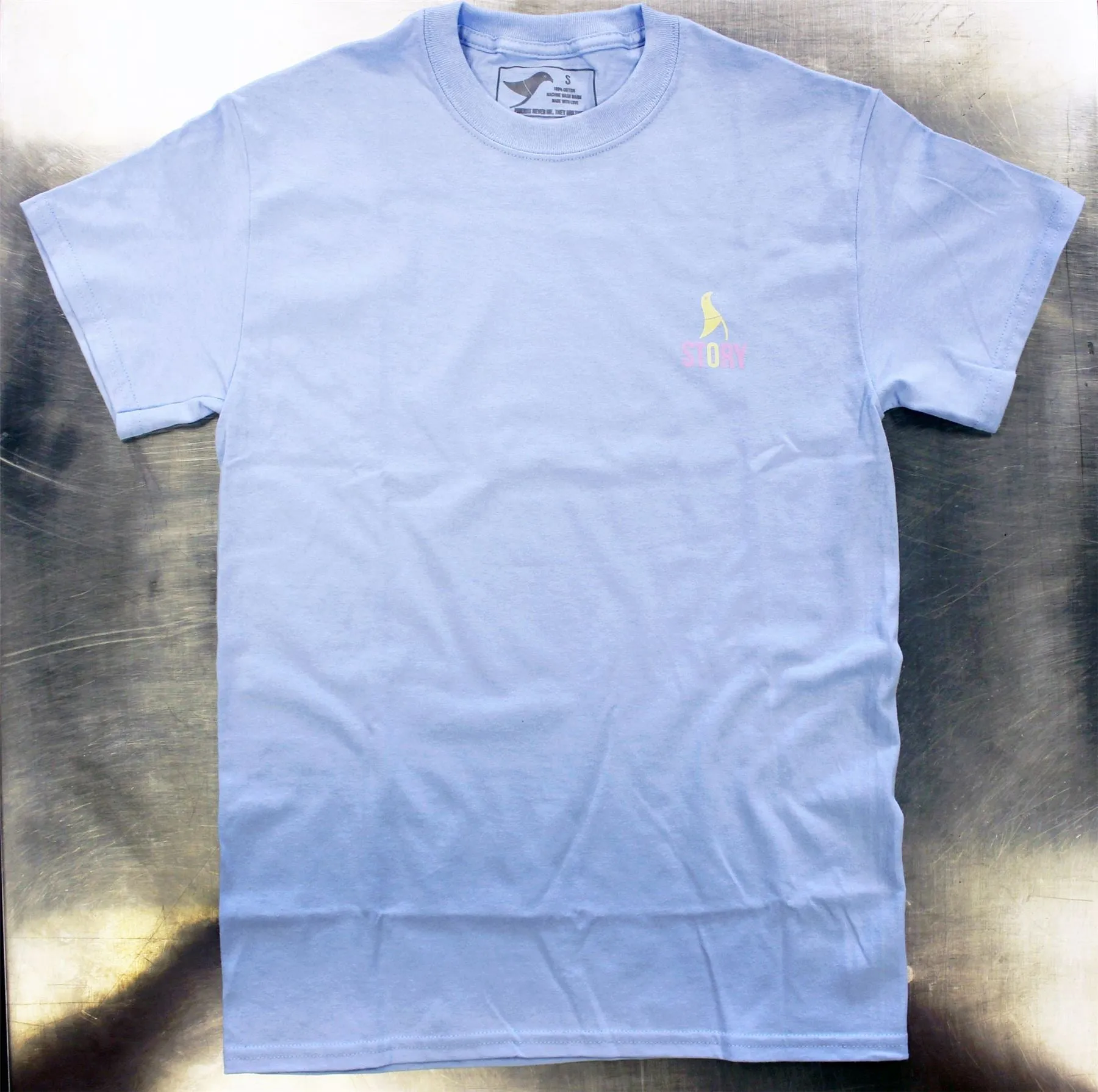 Story Queenie Crest Tee Light Blue