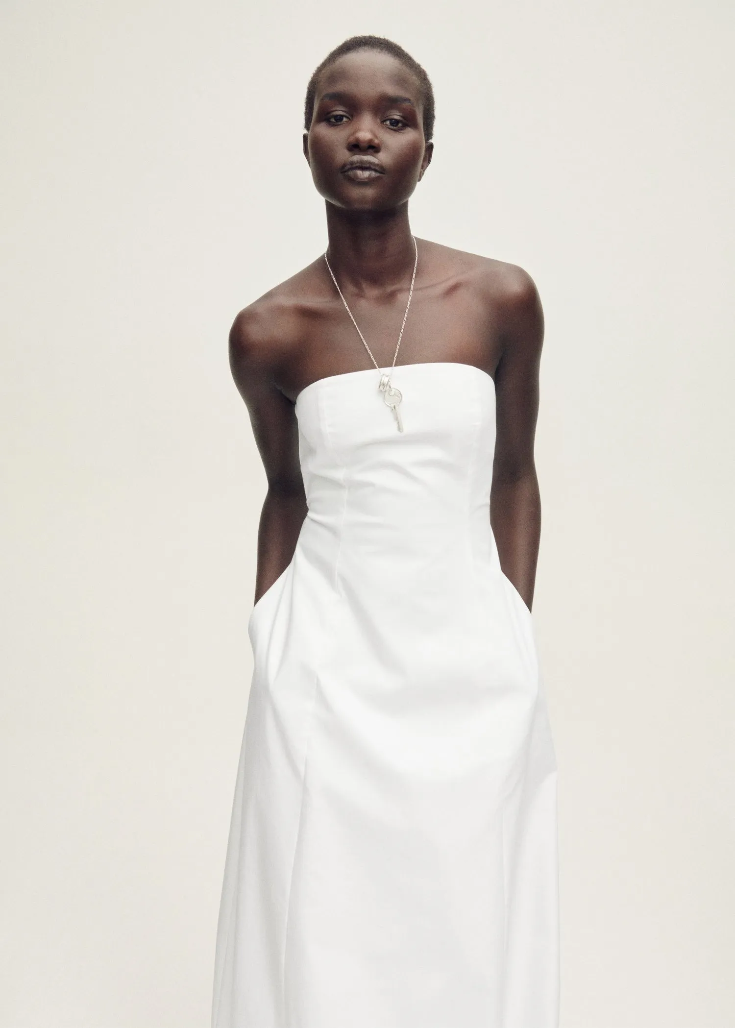 Strapless dress with puffed hem