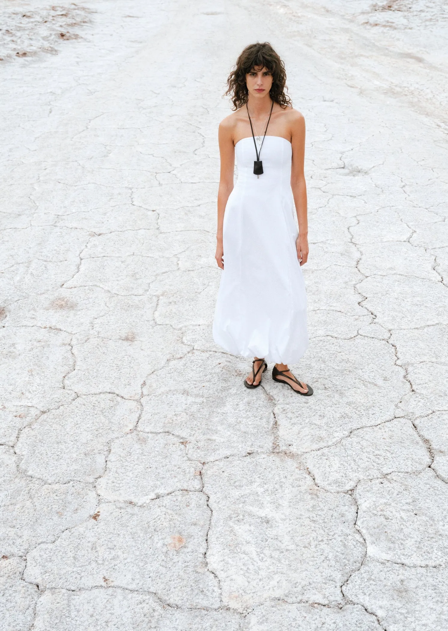 Strapless dress with puffed hem