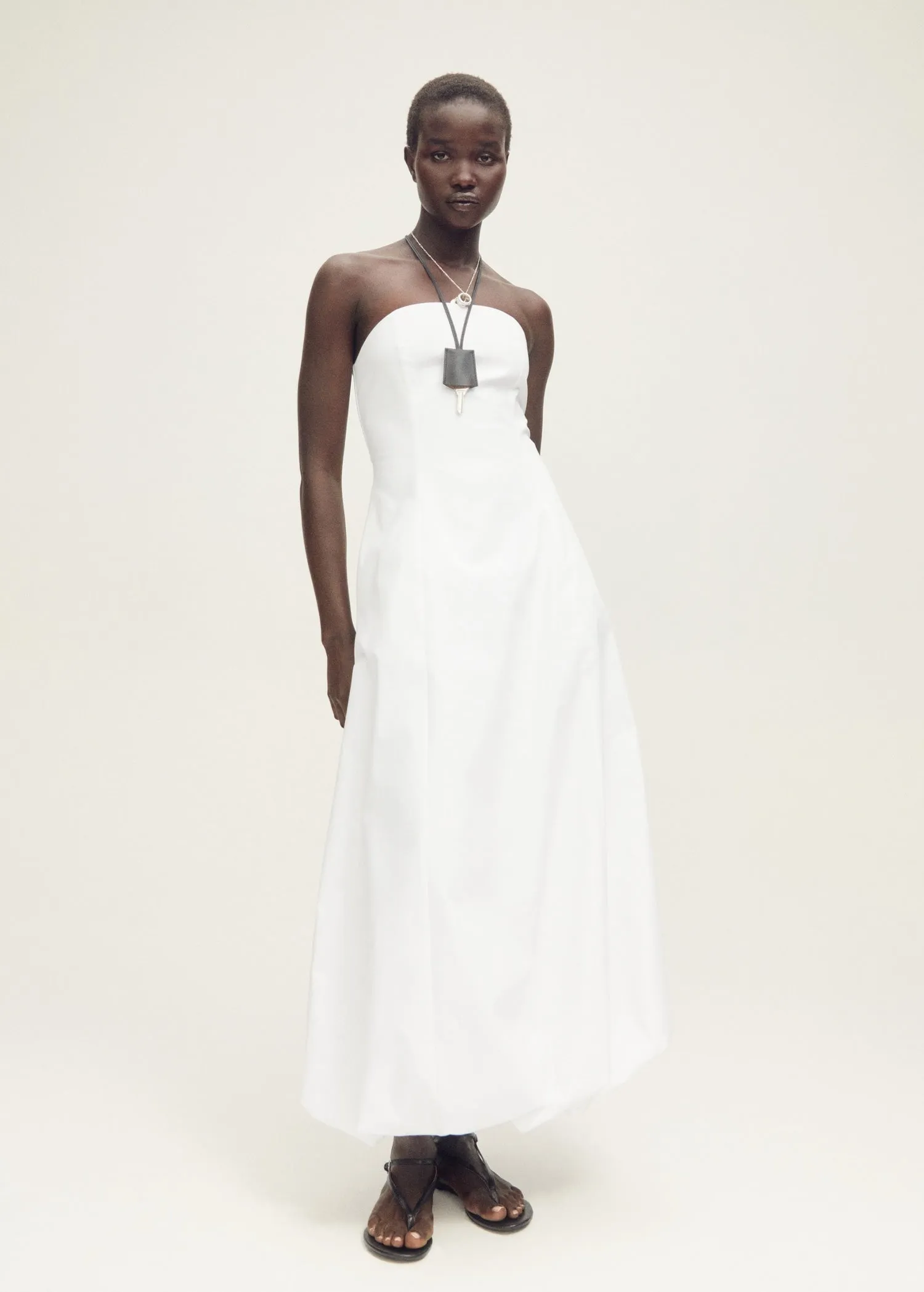Strapless dress with puffed hem