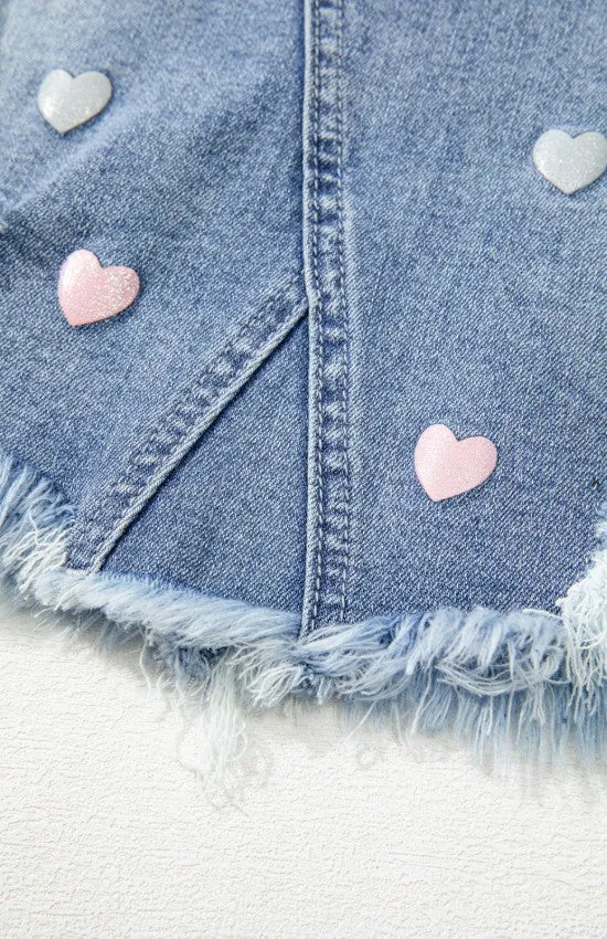 The Heartbreaker Skirt – Distressed Raw Hem Denim with Heart Detail