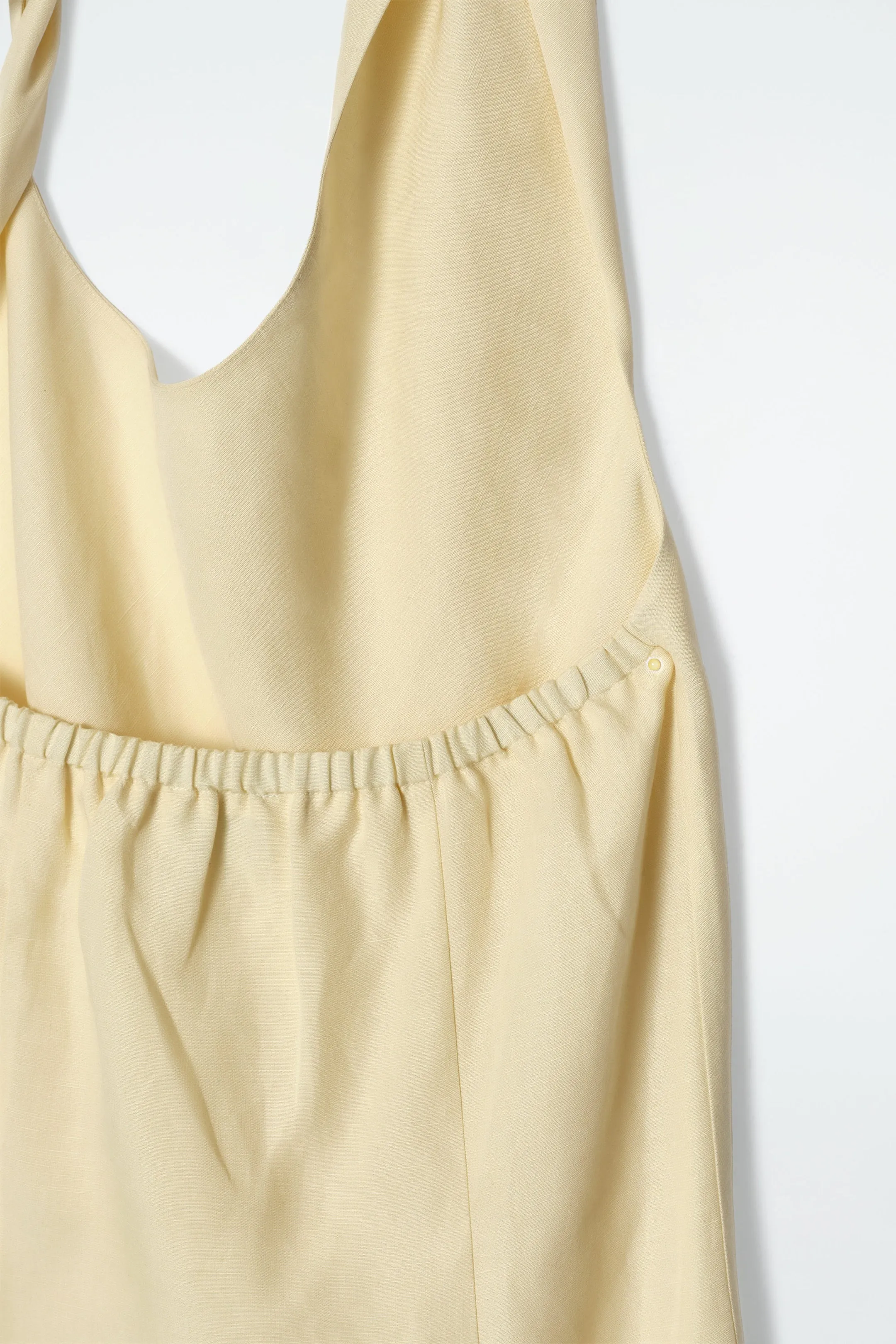 Twisted linen-blend halterneck dress